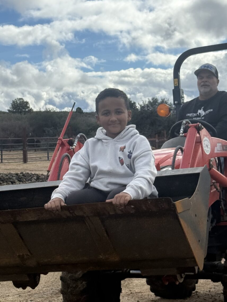 boy tractor scoop.webp boy tractor scoop.webp